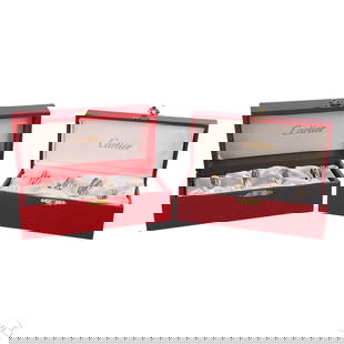 Cartier Trinity Sterling Silver Napkin Rings 8 SET: Cartier sterling silver Trinity napkin rings, set of eight. Includes two Cartier red fitted boxes with satin interiors, each holding four napkin rings. Each ring features the interlocking triple band