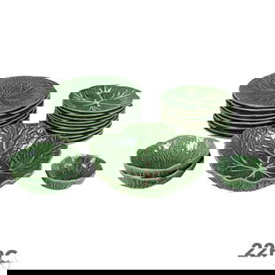 22 Piece LOT of Bordallo Pinheiro Cabbage Plates: Estate lot of twenty-two (22) Bordallo Pinheiro Portugal ceramic pieces in green cabbage design. Includes eight (8) dinner plates measuring 10.25" x 10.25" x 0.25", six (6) smaller plates at 7.5" x 7.