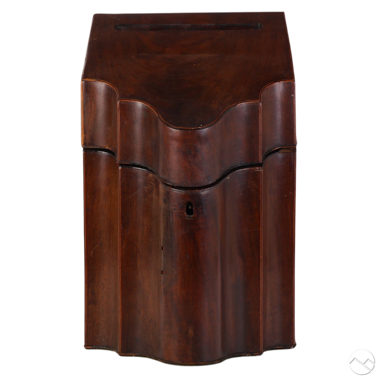 Georgian Wood Knife Box Converted to a Letter Box: Georgian period mahogany serpentine-front knife box later converted to a letter box, featuring an inlaid star motif on the interior lid and a green felt-lined interior. Retains the traditional sloped 