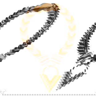Louis Vuitton Essential V Chain Statement Necklace: Louis Vuitton Paris two tone V lock collar necklace featuring gold and silver tone chevron links with a central gold tone V pendant and cylindrical silver tone accents. Marked LV on the pendant with m