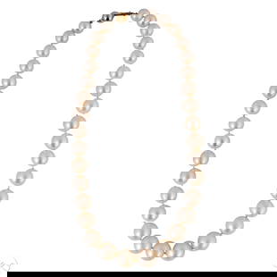 14k Gold Clasp 10-13mm South Sea Pearl Necklace: Cultured South Sea pearl necklace featuring individually knotted 10-13mm pearls, measuring approximately 18" long. The necklace is secured with a yellow gold ball clasp marked 14. Combined approximate
