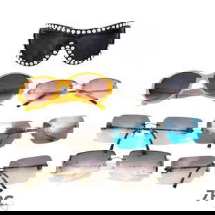 (7) Pairs of Chanel Ladies Designer Sunglasses LOT: Seven pairs of women's Chanel designer sunglasses in a variety of iconic styles and finishes. Includes four rimless shield and wraparound designs with gradient lenses, rhinestone CC logos, and bold si