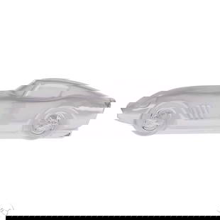 Daum Crystal Corvette Coupe Automobile Paperweight: Daum (French), crystal model of a Corvette coupe automobile paperweight, featuring etched racing number "2" and wheel details. Executed in clear crystal. Signed Daum France on the underside. Descripti