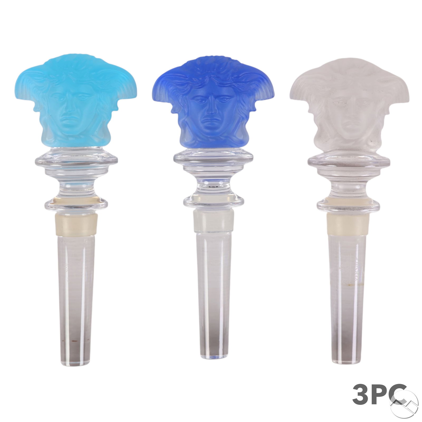 Versace Rosenthal Crystal Medusa Wine Stopper LOT: Estate lot of three Rosenthal for Versace crystal wine bottle stoppers featuring the iconic Medusa head motif. Each stopper is formed in clear, cobalt blue, and frosted turquoise crystal, with the Med