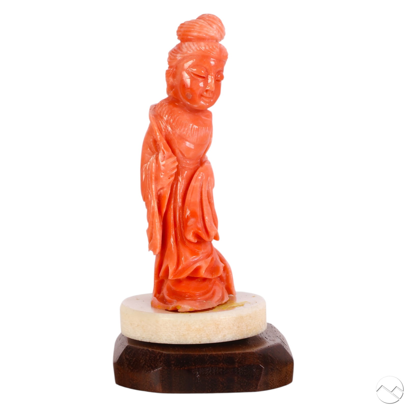 Chinese Carved Red Branch Coral Quan Yin Figurine: Chinese finely carved Guanyin (Quan Yin) figure rendered from natural branch coral in a soft salmon-pink hue. Depicted standing in flowing robes with hands clasped and hair arranged in a high chignon,