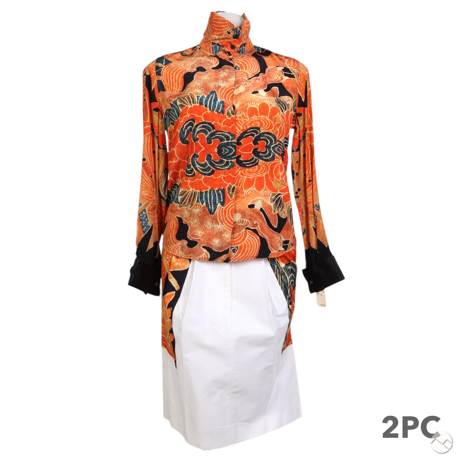 Dries Van Noten Silk Shirt & Cotton Skirt 2pc SET: Two piece assemblage of designer Dries Van Noten apparel including a long sleeve silk blouse with an abstract floral and wave print in shades of orange, navy, and gold. Designed with a band collar, bu