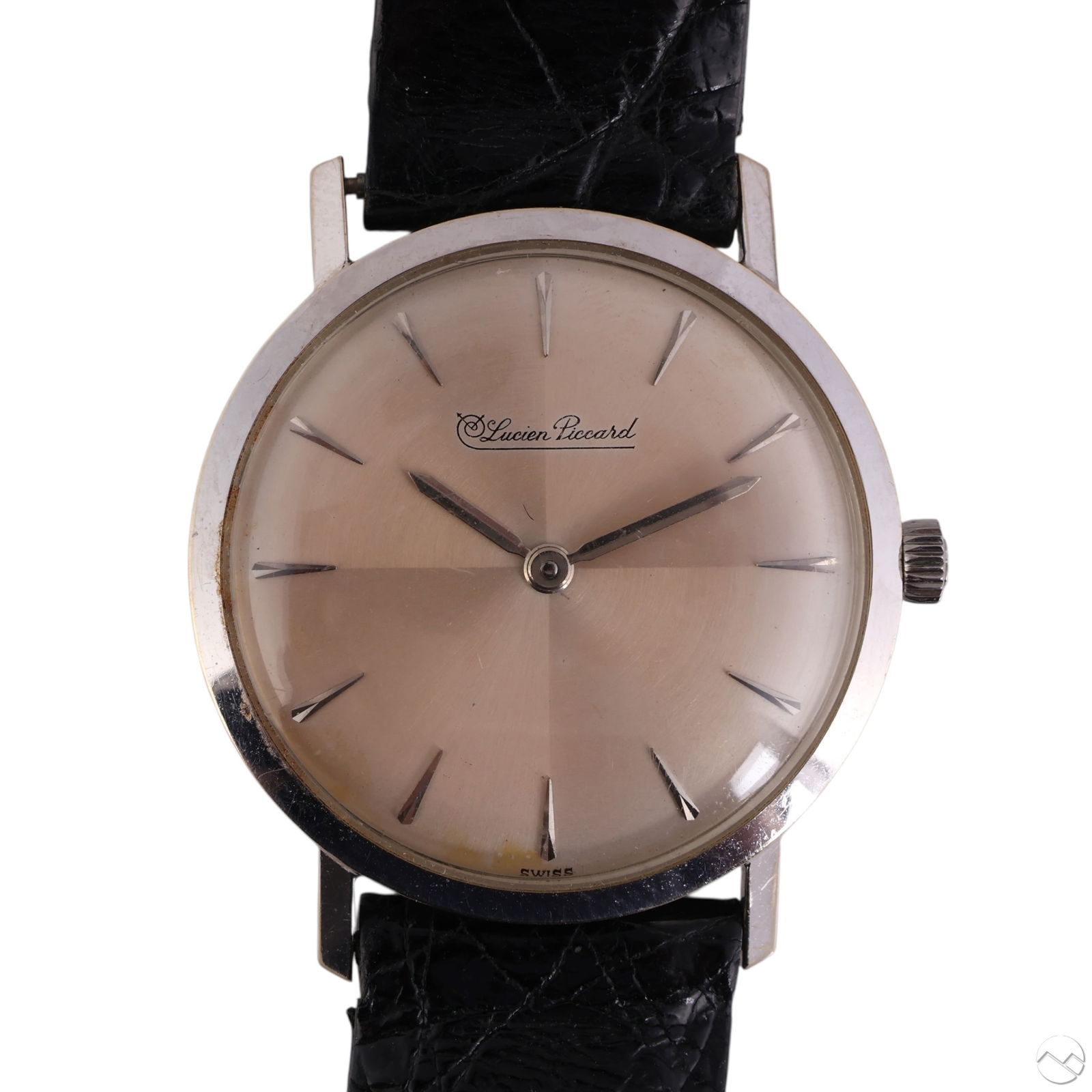 14k White Gold Lucien VTG Mechanical Wristwatch: Lucien Piccard vintage wrist watch crafted in 14K white gold, featuring a working mechanical movement and a silver-tone sunburst dial with minimalist hour markers, black stick hands, 31mm round case n