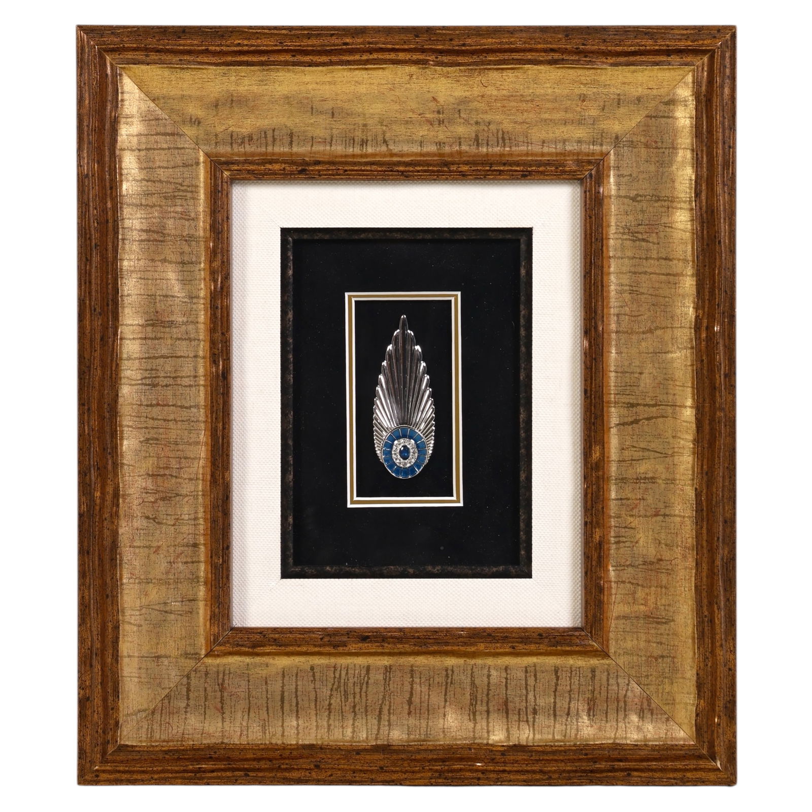 Erte "Plume" Silver Enameled & Gemstone Pin FRAMED: Erte (Romain de Tirtoff, 1892-1990, Russian), Plume, sterling silver brooch accented with blue enamel and clear crystal rhinestones, featuring a winged Art Deco-inspired design with feathered motifs r