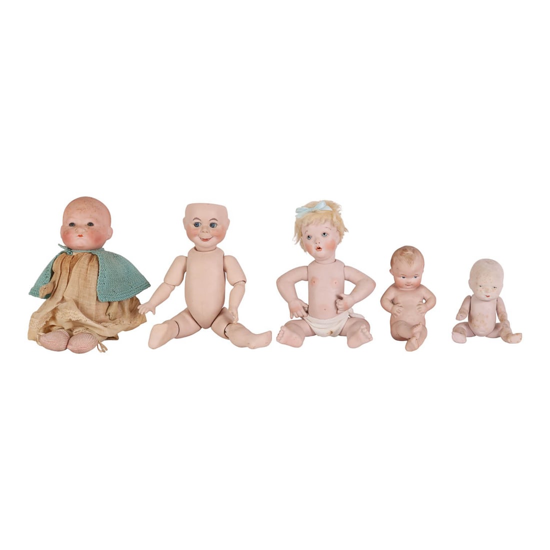 Antique Bisque Character Baby Dolls 5pc ESTATE LOT: Group of five antique bisque baby and character dolls including a Kunstler Krippel baby with cloth body, a small bisque baby marked 682 / Germany, a bisque jointed character doll marked K star R (Kamm