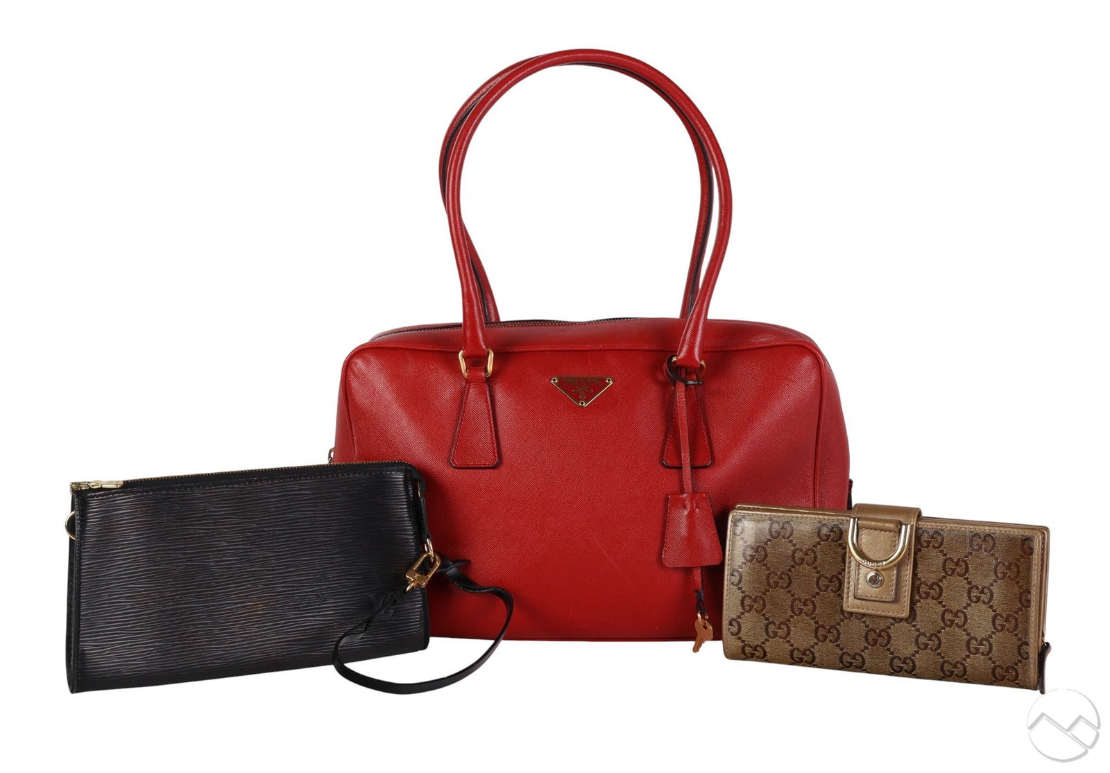 Gucci Prada Yves St Laurent Designer Purse Bag LOT: Lot of three luxury designer handbags including a Prada red Saffiano leather satchel with dual handles, gold tone hardware, and red textile interior, measuring approximately 7.5" x 11.75" x 3" with a