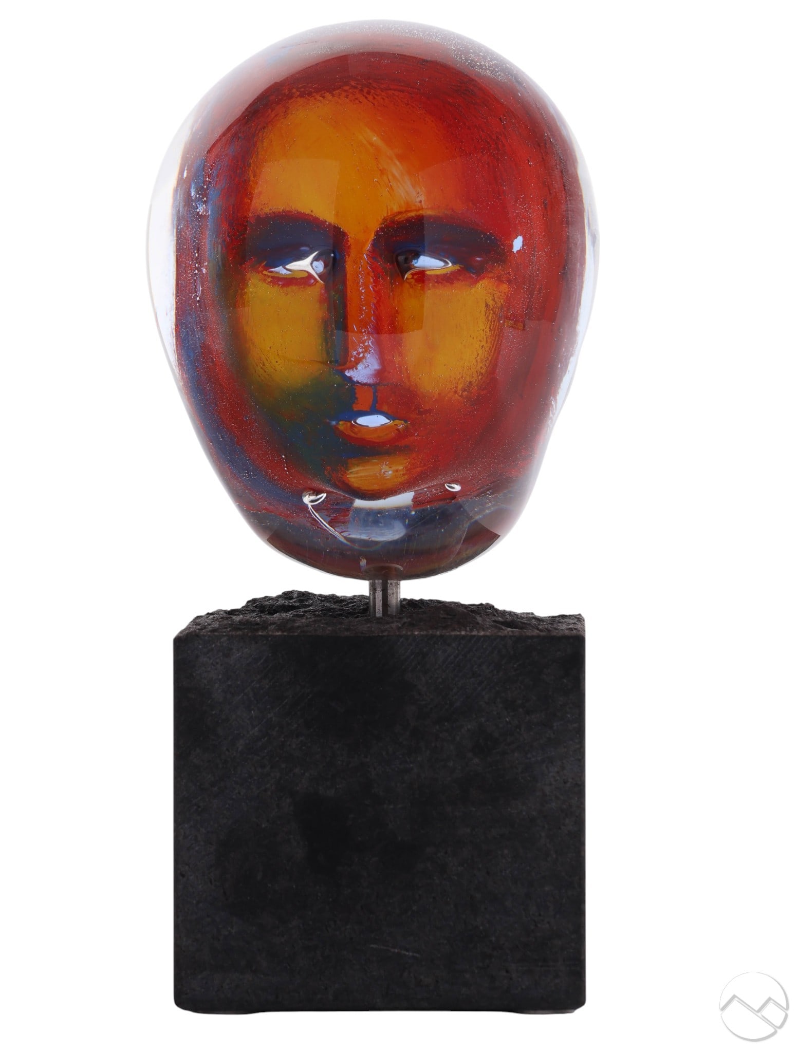 Bertil Vallien b.1938 Kosta Boda Head Sculpture: Bertil Vallien (Swedish, born 1938), Kosta Boda Atelier collection studio art glass head sculpture featuring a stylized face in red, yellow, and blue tones encased in clear glass. Mounted on a square