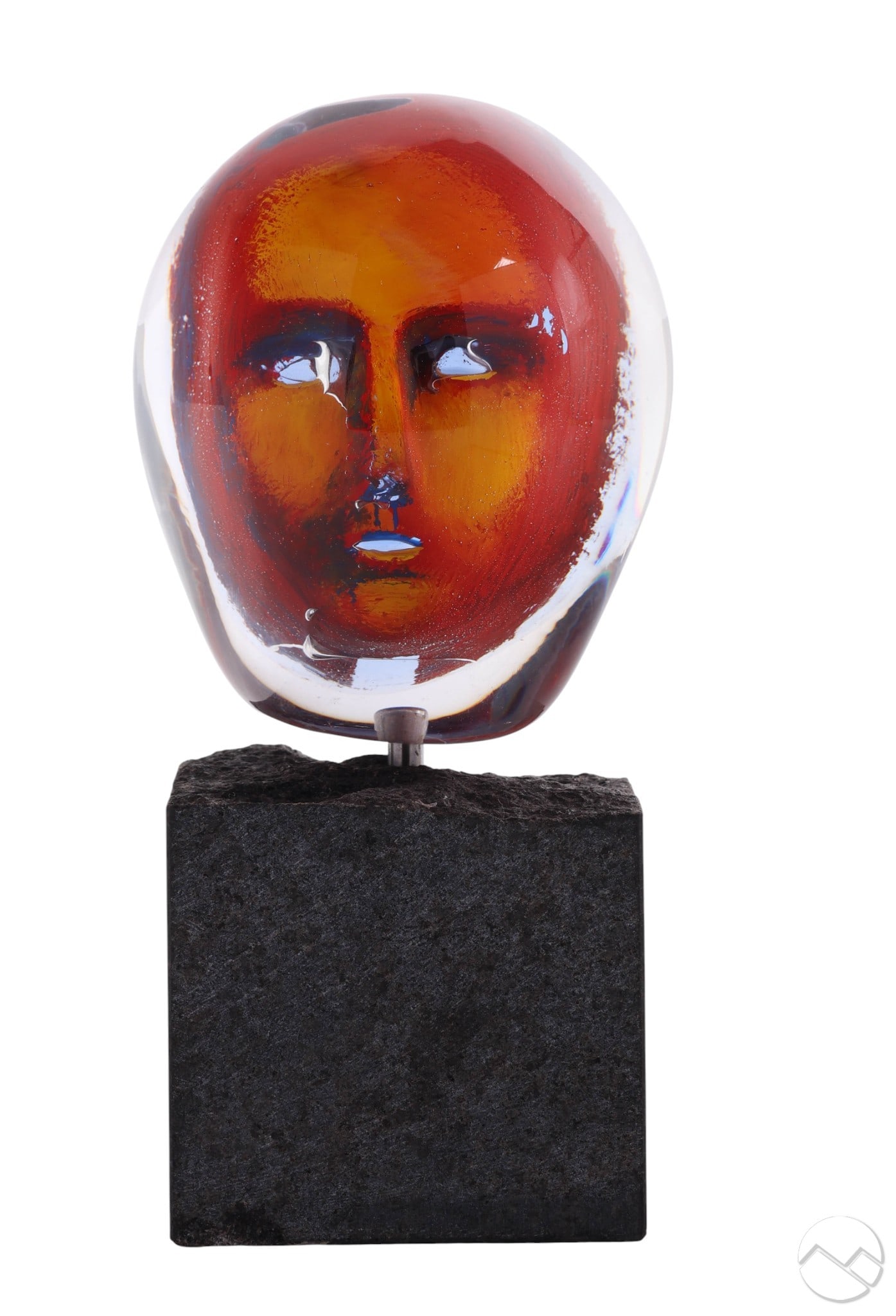 Bertil Vallien b.1938 Kosta Boda Head Sculpture: Bertil Vallien (Swedish, born 1938), Kosta Boda Atelier collection studio art glass head sculpture featuring a stylized face in red, yellow, and blue tones encased in clear glass. Mounted on a square