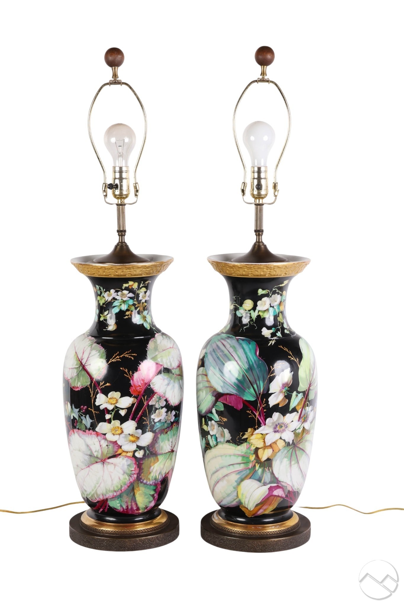 Pair of French Old Paris Porcelain Painted Lamps: Pair of French Old Paris porcelain lamps with large ginger jar-style bodies. Decorated with handpainted botanical motifs on a black ground, accented by gold gilding at the lip and base. No apparent si