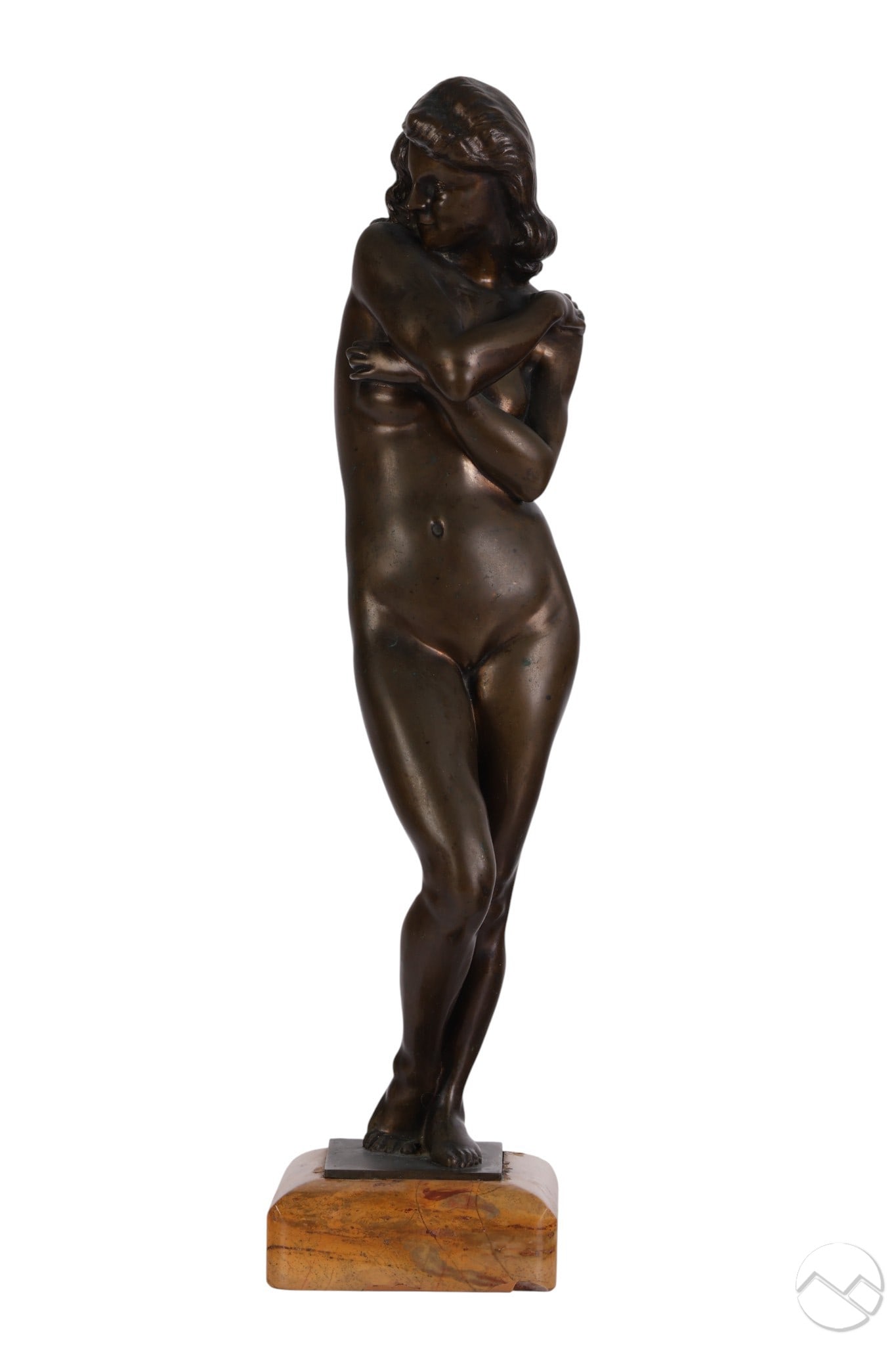 Bronze Figural Nude Female Sculpture Marble Base: Figural nude bronze sculpture depicting a standing young woman with crossed legs and arms folded across her chest. Elevated on a square plinth mounted to a variegated yellow brown marble base with rou