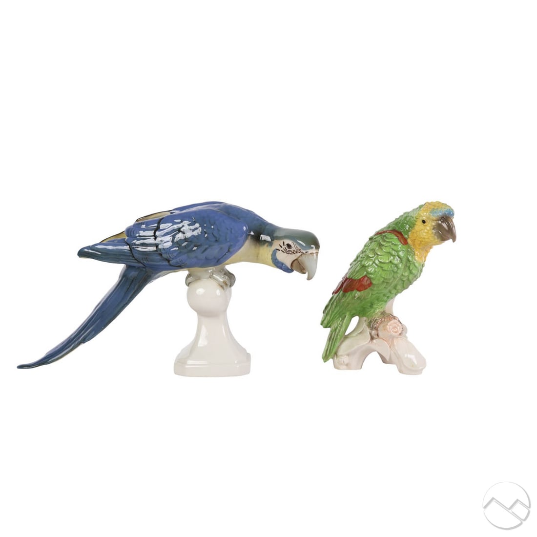 Royal Dux & Goebel Macaw Parrot Bird Figurine LOT: Estate lot of two porcelain parrot figures including a large Royal Dux Bohemian Czech porcelain blue macaw perched on a white pedestal base, and a green and yellow parrot with red wing accents, modele