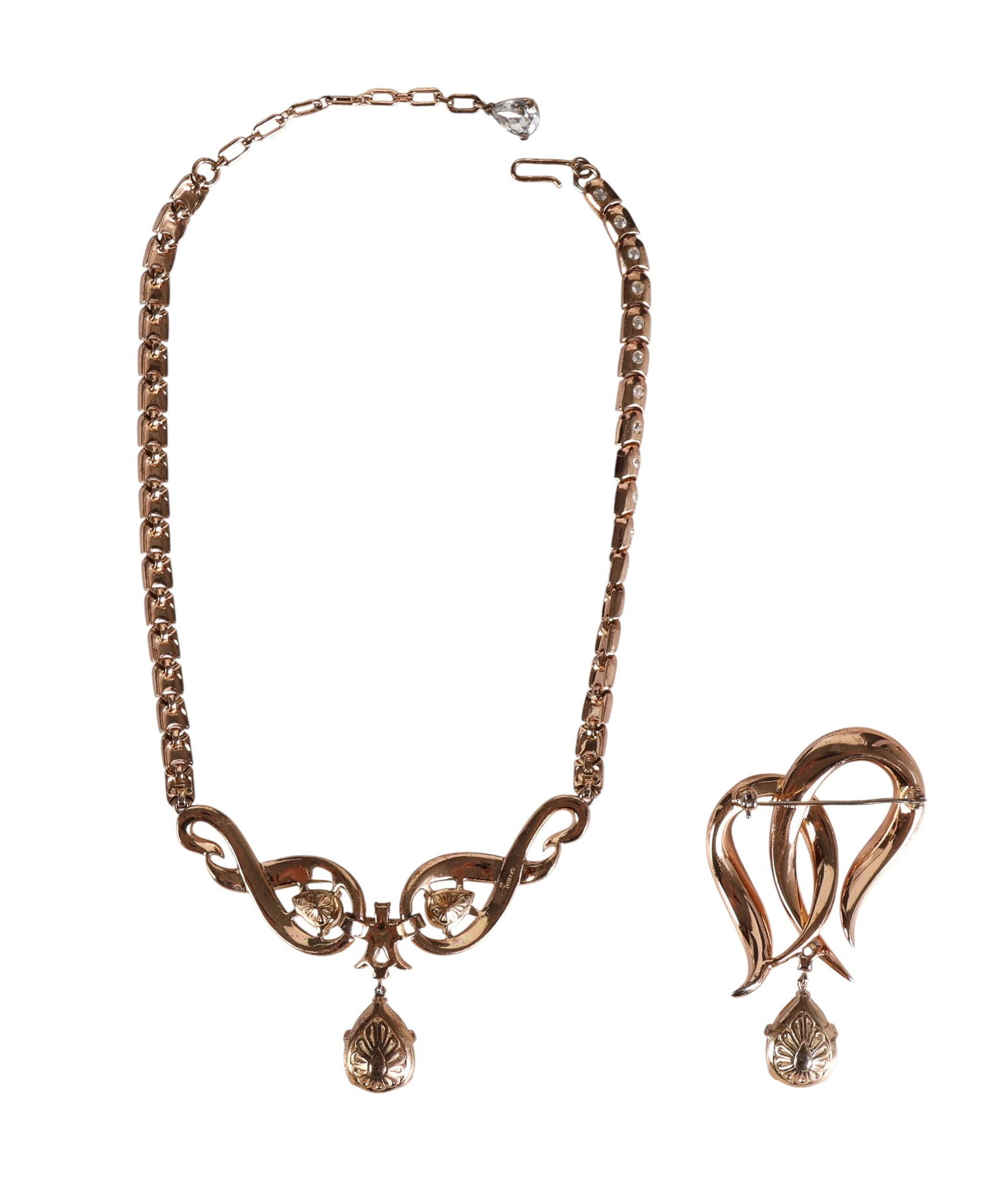 Trifari 1951 Gem of India Necklace and Brooch SET: Trifari vintage gold-plated necklace and brooch set from the 1951 "Gem of India" collection, designed by Alfred Philippe. The necklace features a hinged centerpiece in a swirling ribbon motif set with