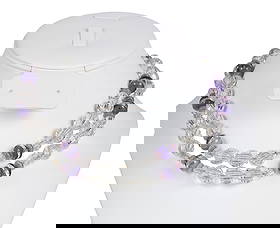 Edwardian Sterling Crystal and Art Glass Necklace: Edwardian antique two-strand necklace from the 1910s featuring lead crystal and art glass elements strung on sterling chain. The design includes checkerboard-faceted crystal beads and discs, alternati