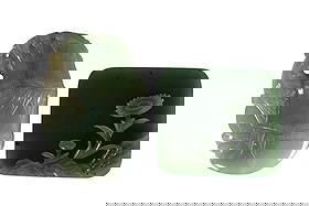 Vintage Carved Jade Pendant and Plaque 2 Piece LOT: Vintage carved jade objects, likely mid-20th century. One: an oval of pale green jadeite intricately carved on both sides with a bird perched on stylized bamboo. A small drilled hole at the top rear a