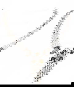 Edwardian 1900s Sterling and Crystal Floral Neckla: Edwardian sterling silver and crystal necklace, circa early 1900s. Centerpiece with sterling frame holding faceted crystal discs with floral centers. Graduated crystal dangles hang below. Filigree pla