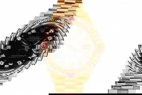 Rolex 18k Gold Datejust 69178 Diamond & Ruby Watch: Rolex 18k yellow gold Oyster Perpetual Datejust wristwatch, reference 69178, circa 1991. Features a factory black dial set with diamond indices and an original Rolex factory diamond and ruby bezel, in