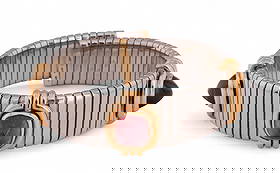 BULGARI Stainless & 18k Gold Gemstone Bracelet: Gemstone cuff bracelet by Bulgari, crafted in stainless steel with 18k gold bezel settings and end caps. The bracelet is set with sugar loaf cabochon cut gemstones including amethyst, pink tourmaline,