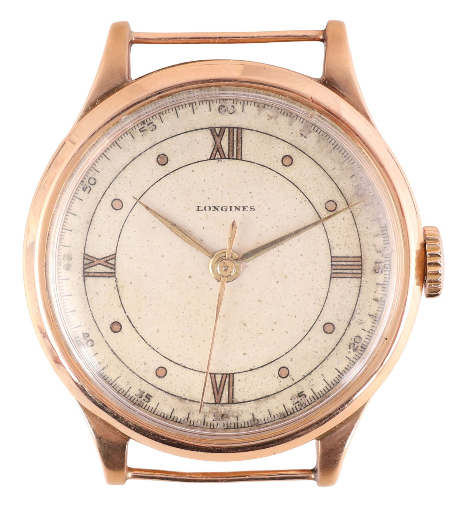 Longines 18k Rose Gold Manual Wind Wristwatch: Longines vintage wristwatch featuring a solid 18 karat rose gold case measuring 35mm in diameter (excluding crown). The silvertone dial is appointed with Roman numerals and an outer minute track, show