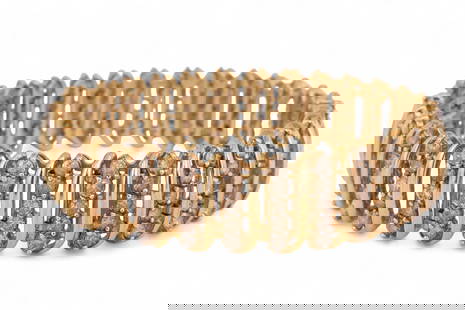 10k Gold 9 CT TW Diamond S Link Tennis Bracelet: Diamond cluster-style S link bracelet crafted in 10k gold. The design is accented with one hundred forty-nine round brilliant-cut diamonds (one missing) totaling approximately 9.00 carats, judged to b