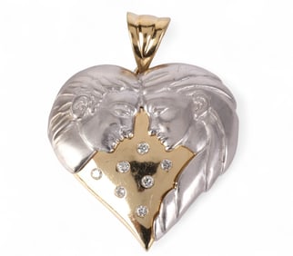 14k Gold .28 CT TW Diamond Figural Heart Pendant