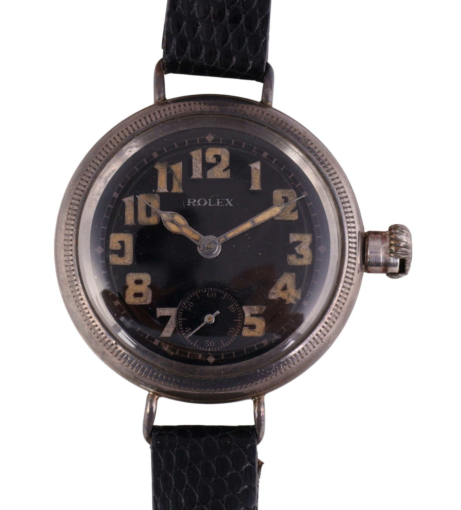 Rolex Sterling Silver Working Trench Style Watch: Rolex early 20th century officers-style trench wristwatch housed in a silver case with a coin-edge bezel and oversized onion crown. The black dial is signed "Rolex" and features bold luminous Arabic n