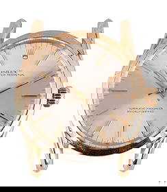 Rolex 14k Gold Oyster Perpetual Bombay Ref. 1010: Rolex vintage Oyster Perpetual Bombay wristwatch crafted in solid 14K yellow gold, reference number 1010. The watch features a silver sunburst dial with applied gold hour markers and matching gold han