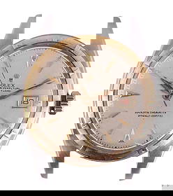 Rolex Oyster Perpetual Datejust 6105 14k/SS Watch: Rolex Oyster Perpetual Datejust wristwatch, reference number 6105, serial number 858433, produced circa 1963. The watch features a 14 karat yellow gold fluted bezel atop a stainless steel case, measur