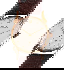 Rolex 14k Solid Gold Ref. 4477 Fancy Lugs Watch: Rolex vintage wristwatch in solid 14 karat yellow gold, reference number 4477, serial number 456562. This early mid-20th century model features a cream dial with applied gold hour markers, including R