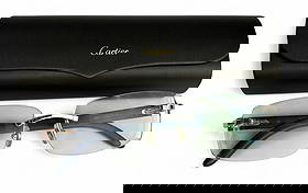 Cartier French Designer Eyeglass Sunglass Frames: Pair of Cartier France luxury designer rimless eyewear featuring chrome-tone hardware and blue wood temples. The frames are signed Cartier and include a black Cartier hard case with a gold logo. Glass