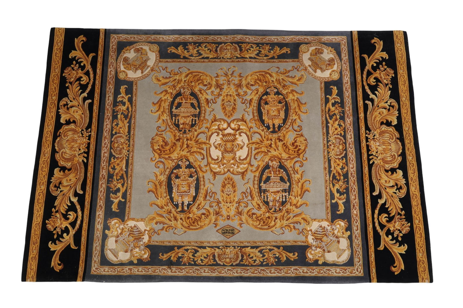 Gianni Versace Wool Top Silk Touch Oriental Rug: Gianni Versace Home Signature hand-knotted oriental rug made of 100% pure wool with a top silk touch finish. The design features acanthus scrolls, architectural medallions, mythological motifs, the ic