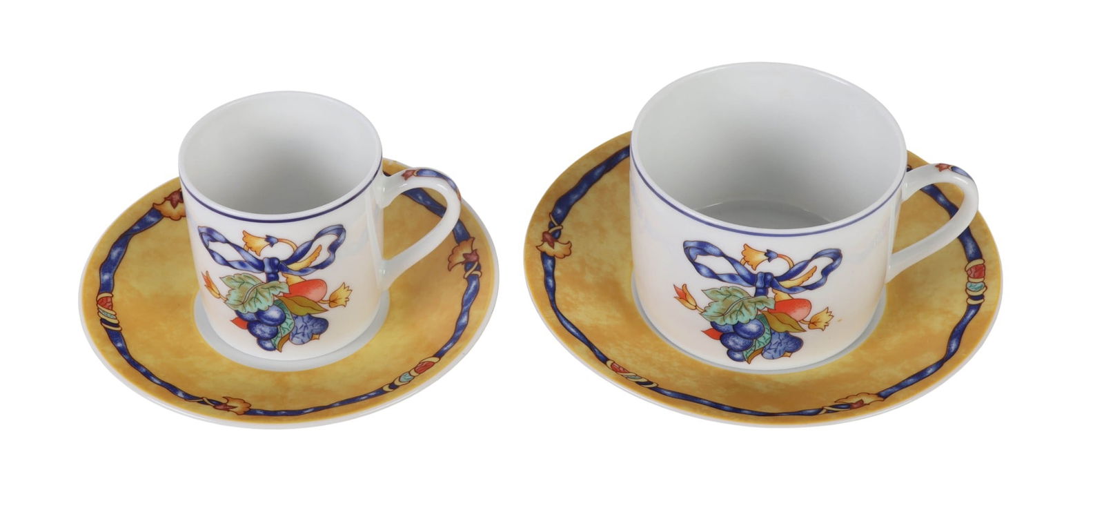 Bernardaud Limoges Borghese Tea Cup and Saucer LOT: Bernardaud Limoges sixteen piece porcelain cup and saucer set in the Borghese pattern, produced between 1993-2010. Decorated with fruit and ribbon motifs framed by yellow and blue borders. Includes fo
