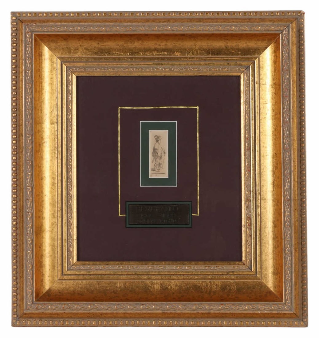 Rembrandt 1906-1669 Standing Man In a Hat Etching: Rembrandt van Rijn (Dutch, 1606-1669), an antique etching on paper depicting a standing male figure shown in profile. Executed with Rembrandt's signature mastery of line and shadow, the work showcases