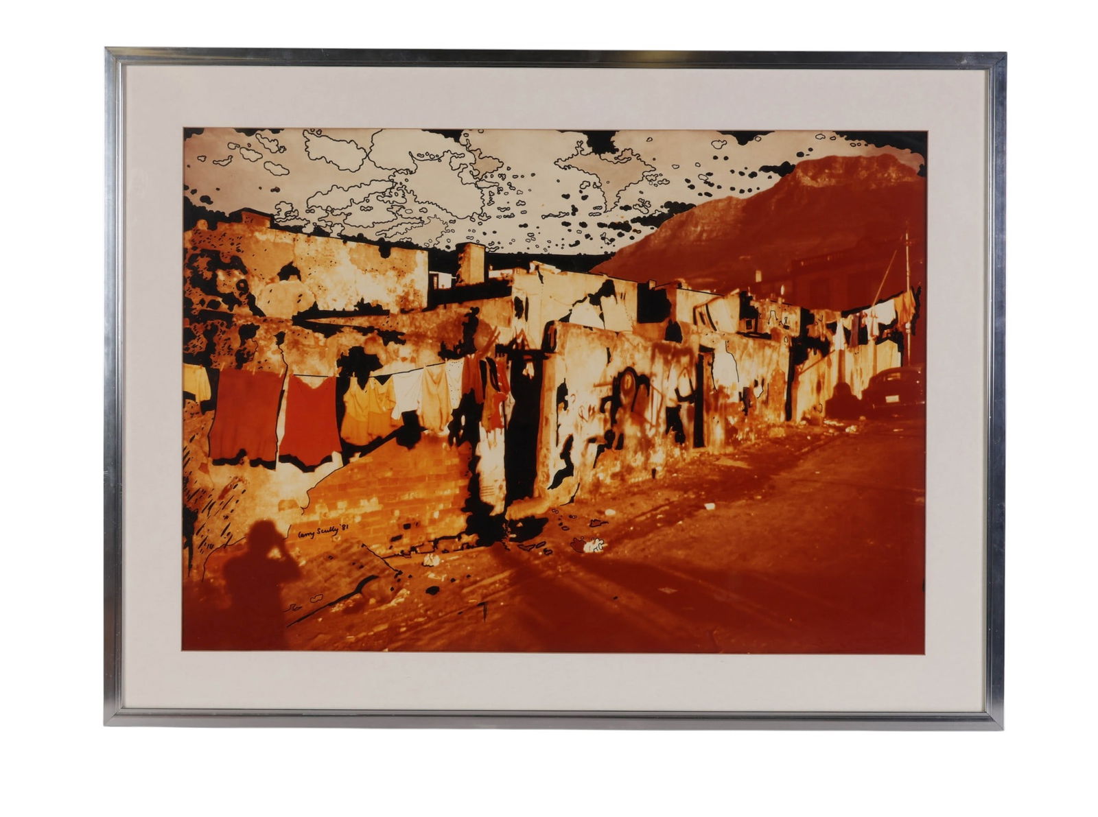 Larry Scully 1922-2002 Embellished Photo SIGNED: Larry Scully (South African, 1922-2022), ink highlighted photograph imagery on paper depicting an abstract urban street scene with laundry strung between crumbling buildings. Rendered in sepia tones w