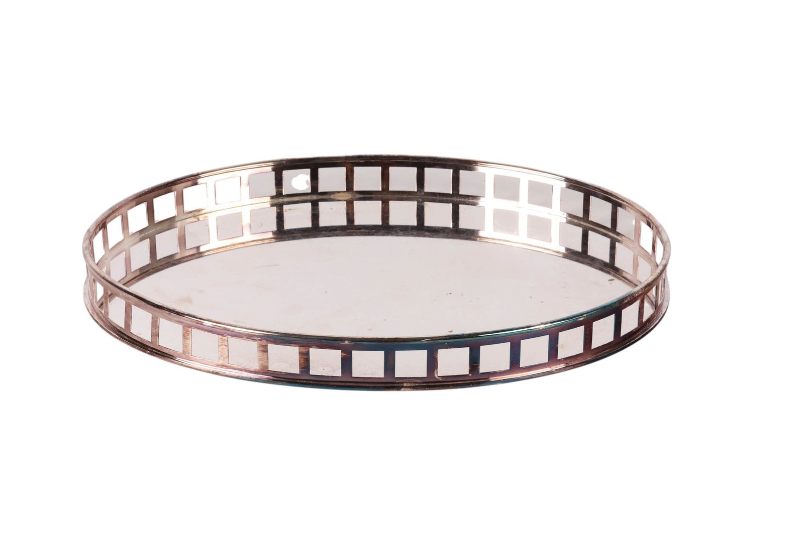 Tiffany & Co Italian Sterling Silver Tray 1,243g.: Tiffany and Co, Italian sterling silver bar tray showcasing an elegant oval form with a finely crafted openwork geometric border. The underside is stamped "Tiffany & Co. 925 Italy," The tray has a com
