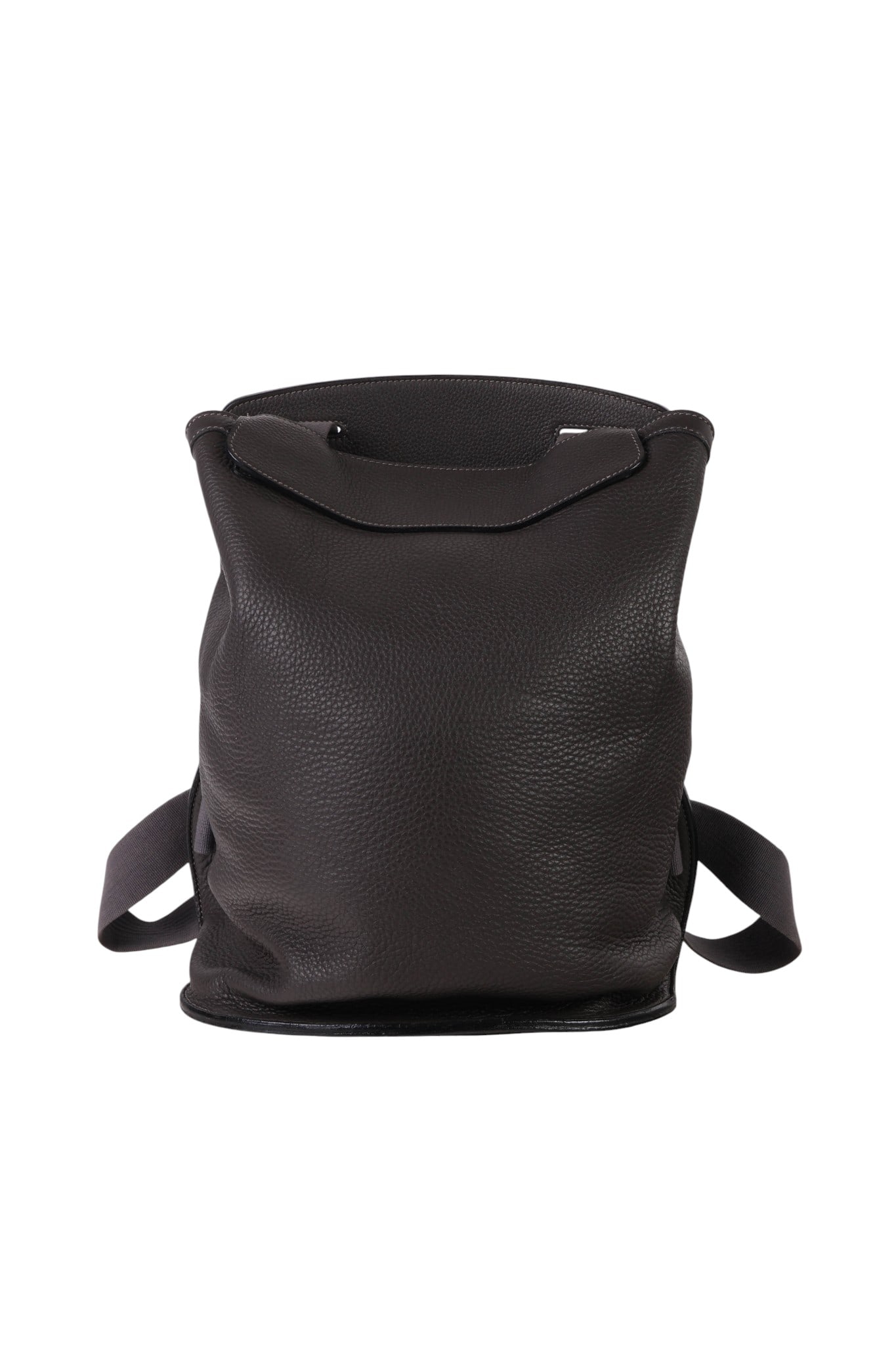 Hermes Pebbled Leather and Canvas Sherpa Backpack: Hermes pebbled grained leather backpack with open top, stitched seams, and canvas shoulder straps that loop through rear panel. Interior includes a slip pocket marked Hermes Paris Made in France. Date