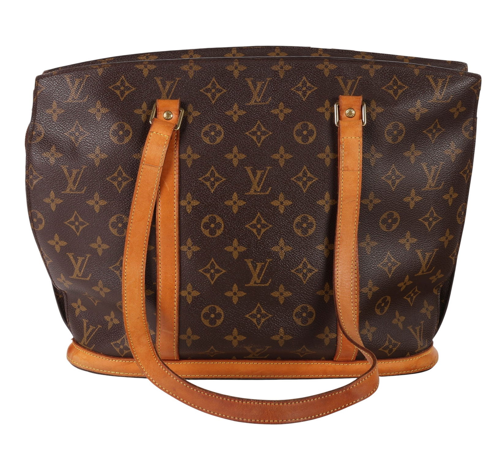 Louis Vuitton Monogram Babylon Shoulder Bag Tote: Louis Vuitton Babylon shoulder tote bag crafted in signature LV Monogram coated canvas with natural Vachetta leather trim and dual flat shoulder straps. The structured silhouette features a wide top z