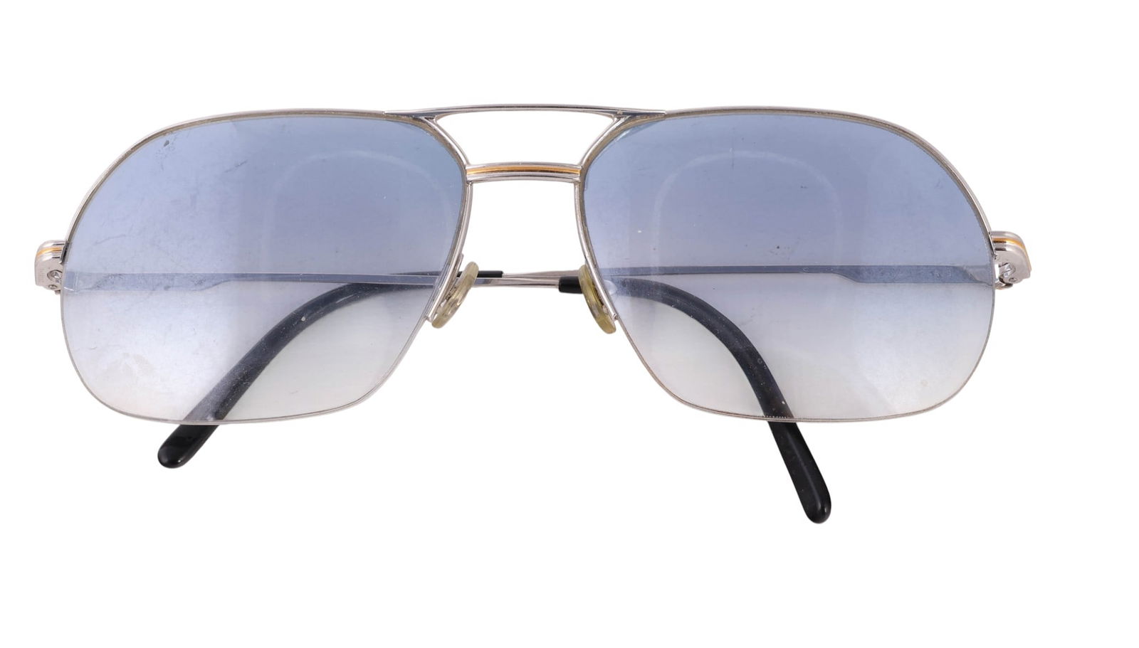 Cartier Paris Designer Aviator Gradient Sunglasses: Cartier luxury French designer brand aviator optical eye wear sunglasses with silver and gold tone frame, gradient blue lenses, and black temple tips. Marked Cartier Paris and Made in France. Model ma