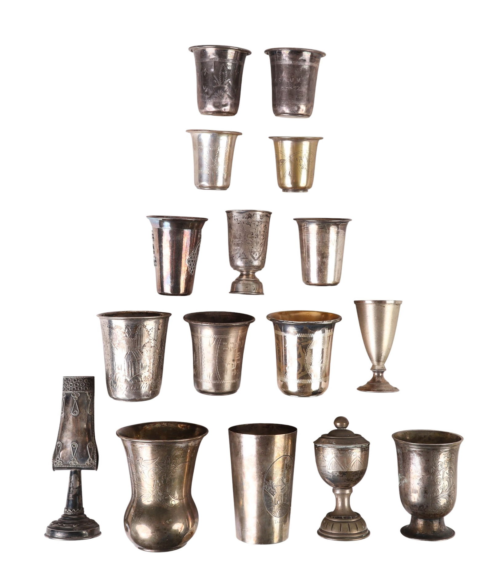 Silver Judaica Kiddush Cup Spice 16pc LOT 403g.: Estate collection of 16 silver Jewish Judaica items including cups of various forms and sizes, along with a spice container and a candleholder. Several pieces are engraved with Hebrew inscriptions, pe