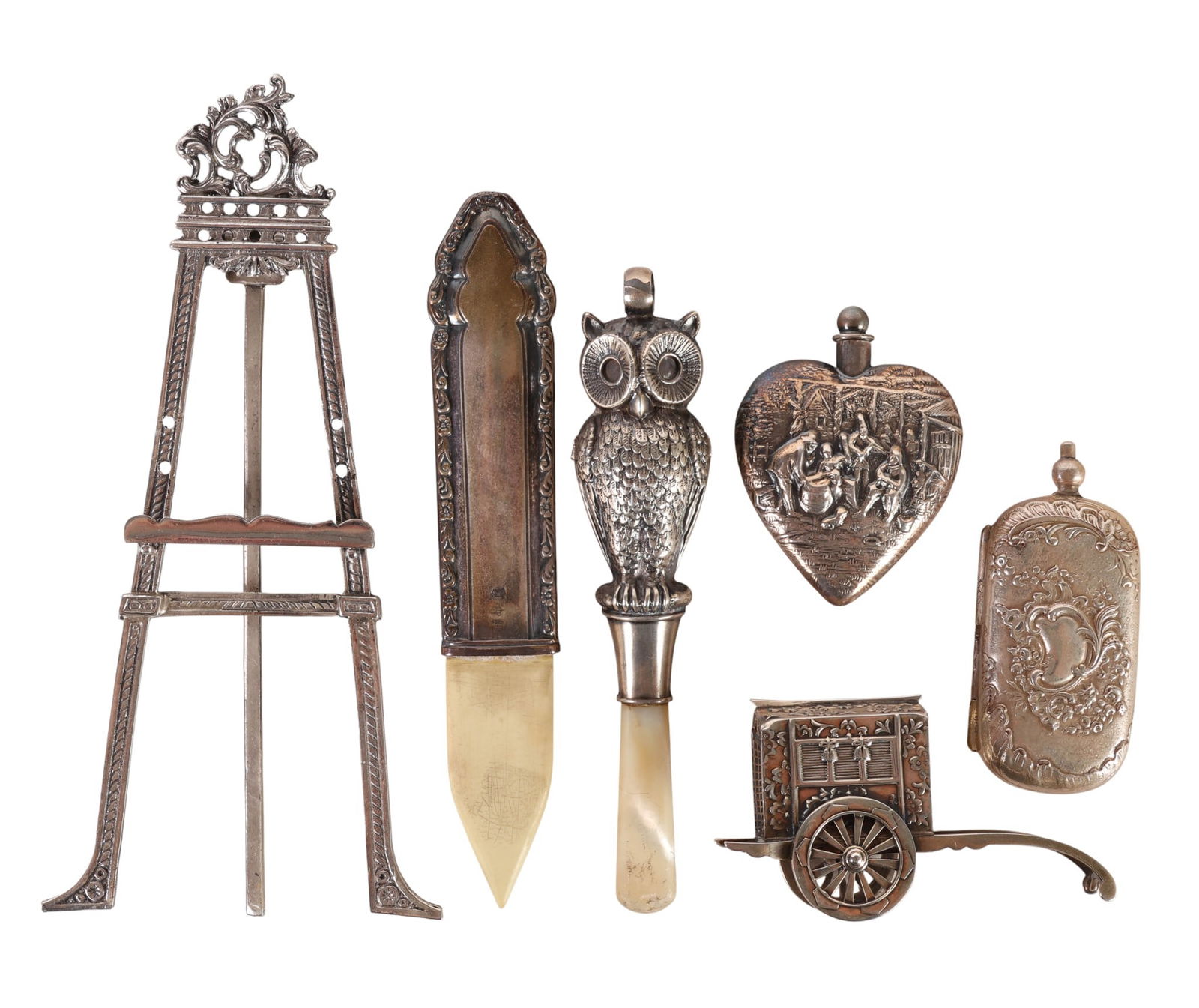 Antique Silver Mini Easel Perfume Vesta & More LOT: Six-piece lot of assorted antique silver and related objects including a miniature folding easel, an Asian-motif cart, a heart-shaped figural scent bottle with stopper, an English hallmarked owl-form