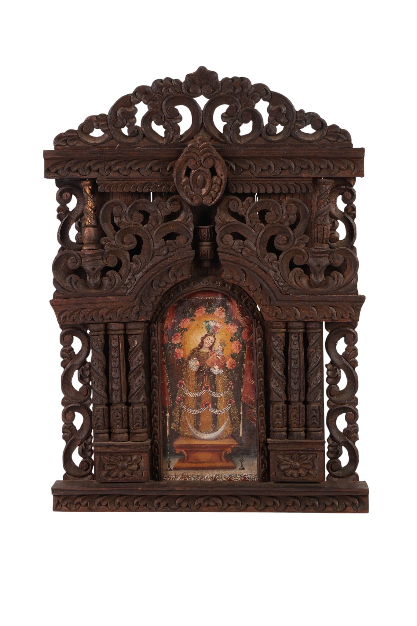 Cuzco School Style Wood Mounted Madonna Painting: Spanish Colonial style oil painting on canvas depicting the Madonna and Child in a floral and celestial setting, presented in a carved dark wood architectural altar-shaped frame with columns,