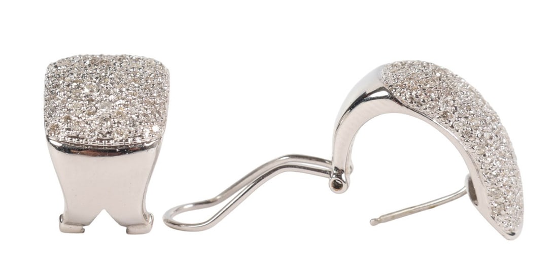 18K Pave Diamond White Gold Omega Post Earrings PR: Pair of 18k white gold clip back earrings fully pave-set with an array of natural round-cut white diamonds across gently domed rectangular panels. The earrings feature a hinged Omega post clip mechani