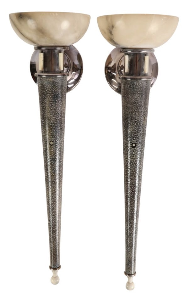 A Petitot Pair of French Art Deco Shagreen Sconces: Pair of French Art Deco wall sconces attributed to A. Petitot, each featuring an elongated tapered body clad in gray and white shagreen, accented with silver-plated or chrome trim. The sconces are