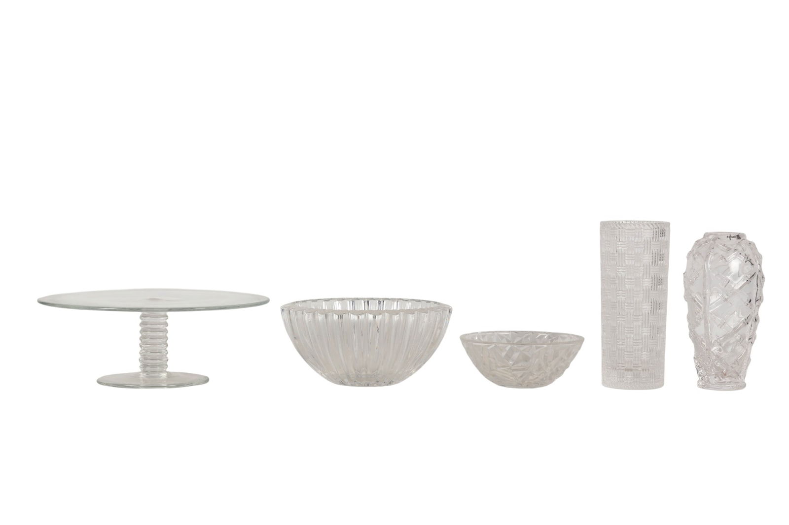 Tiffany & Co Crystal Cake Plate Bowl & Vase 5p LOT: Five-piece estate lot of Tiffany and Co crystal including one pedestal cake stand, two vases, and two bowls. The pieces vary in form and size, with approximate measurements ranging from 2.5 x 6