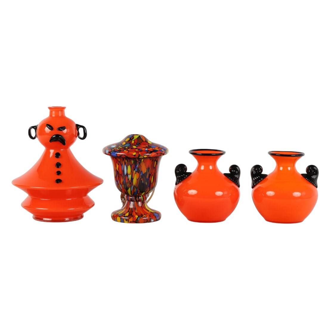Czech Spatterware Lamp & Tango Art Glass Vase LOT: Group of four Bohemian Czech art glass pieces including a lidded multicolor electric lamp, two matching orange vessels with black winged handles, and one orange sculptural bottle with black facial