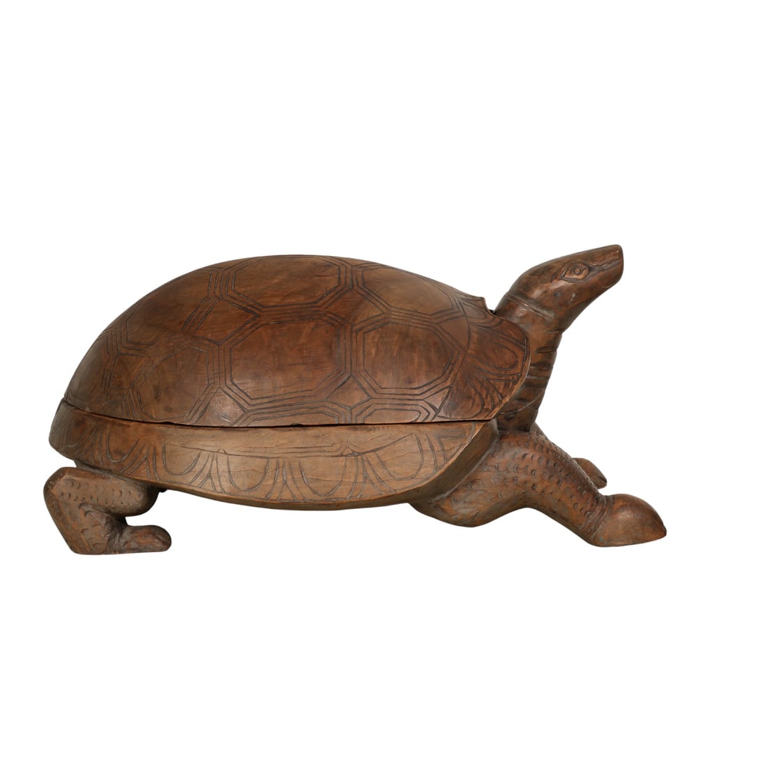 Hollywood Regency Oversized Carved Wood Tortoise: A large oversized Hollywood Regency inspired hand carved wooden turtle with a patterned shell and incised surface details. The hollow body features an interior storage compartment accessed by lifting