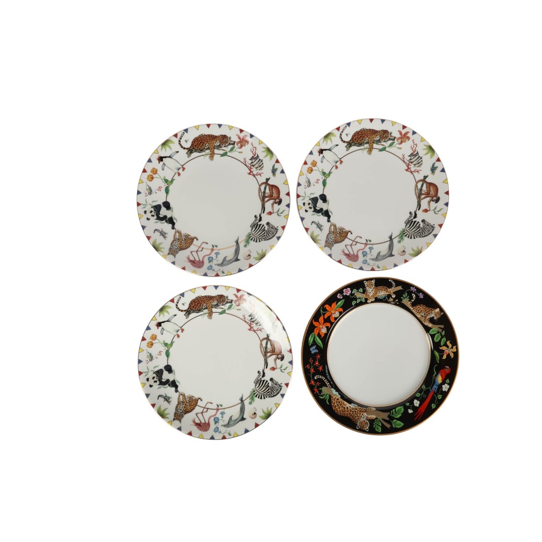 Lynn Chase Jaguar Jungle Harmony Dinner Plates 4pc: Four Lynn Chase Designs porcelain plates, including one Jaguar Jungle plate and three Harmony plates. The Jaguar Jungle plate features wildlife and jungle motifs with leopards, pandas, zebras,